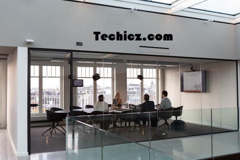 The team members are meeting to discuss 'What is proposal automation' and its implications for the company.
